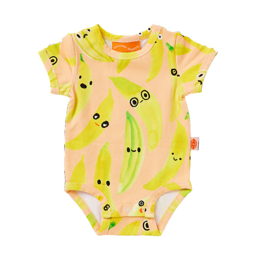Baby onesie with banana pattern on a white background