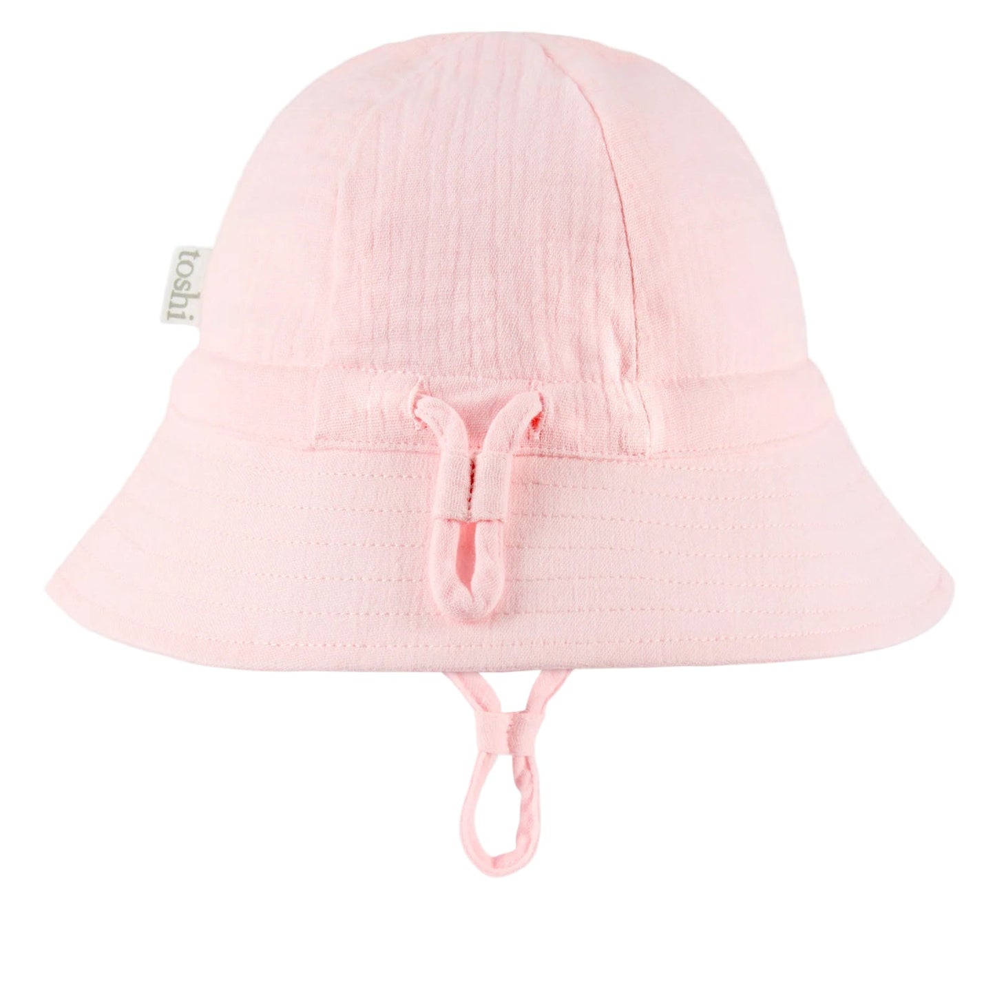 Pink sun hat with UPF 50+ label on a white background