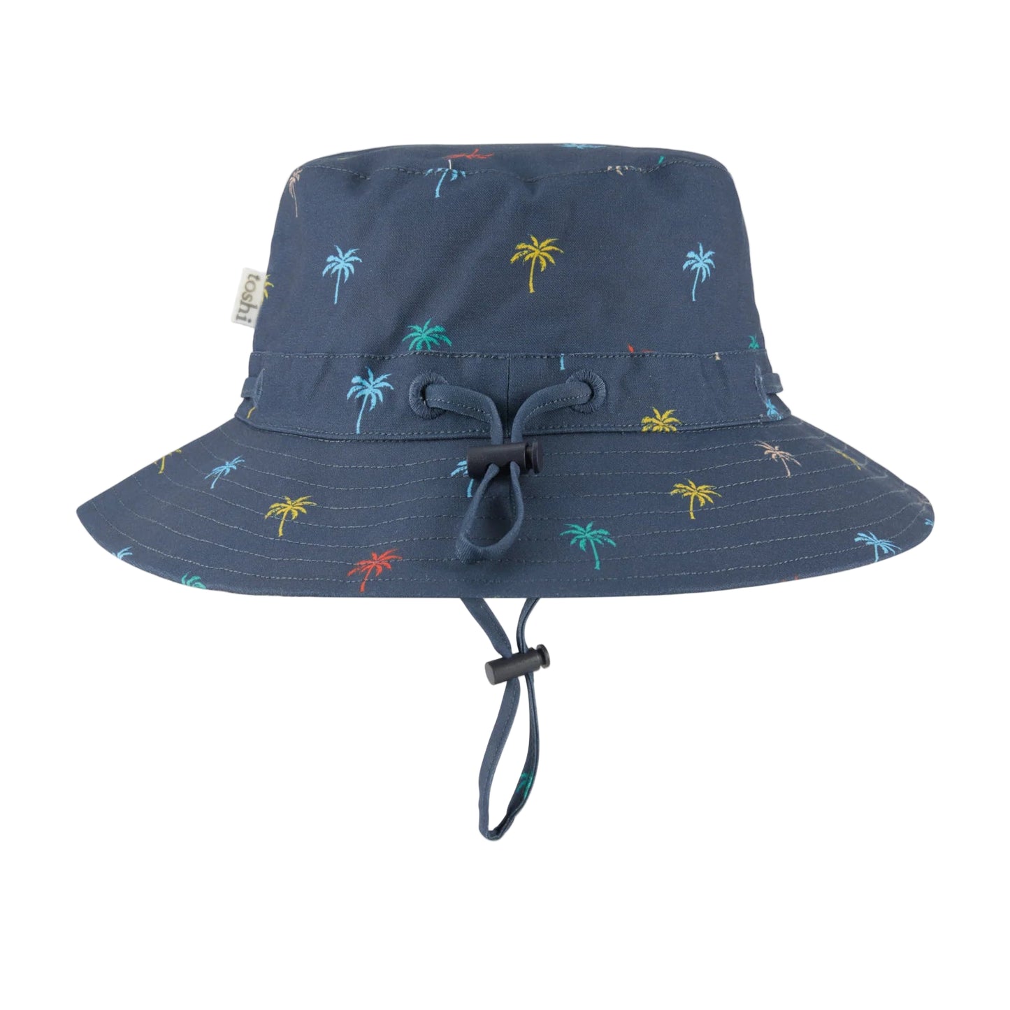 Navy bucket hat with palm tree pattern and UPF 50+ label on a white background
