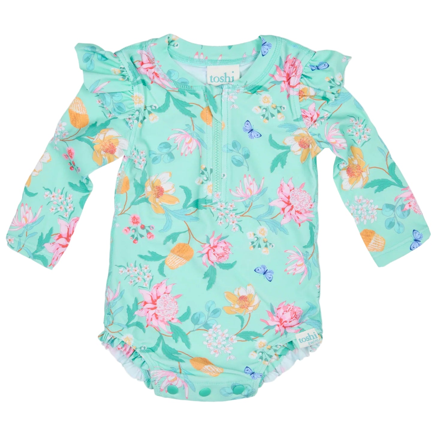 Floral-patterned baby romper with UPF 50+ sun safety label on a white background