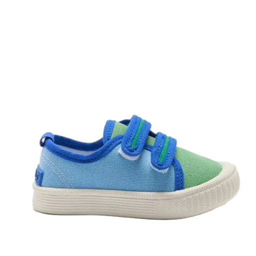 Green and blue children's sneaker on a white background