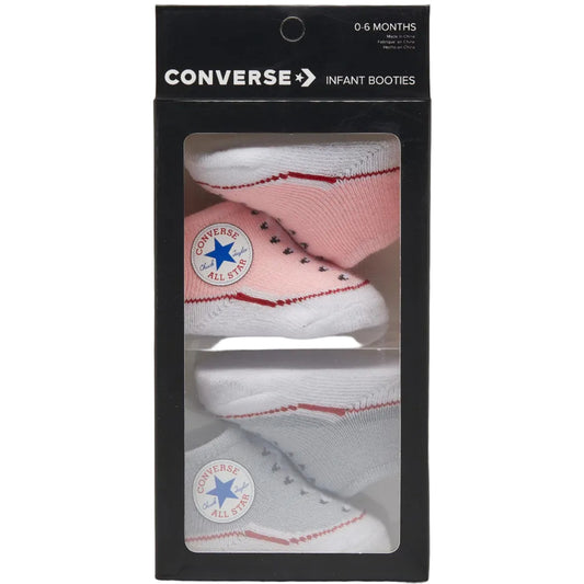 Converse infant booties in packaging on a light gray background