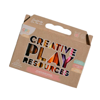 Box of 'Creative Play Resources' on a wooden surface with a white background