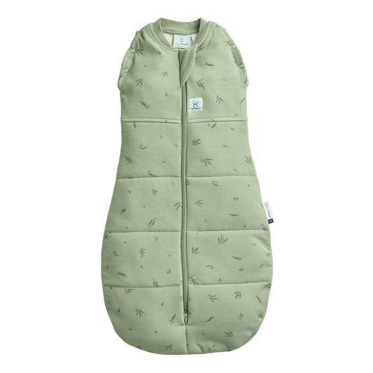 Green baby sleeping bag with leaf pattern on a white background