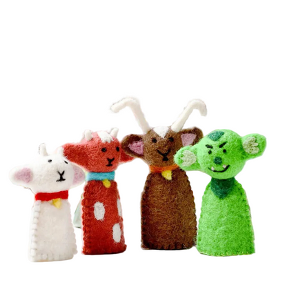 Set of finger puppets in front of a book titled 'The Three Billy Goats Gruff'.