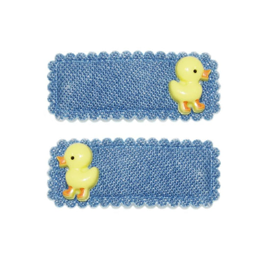 Two blue bath mats with yellow duck decorations on a white background