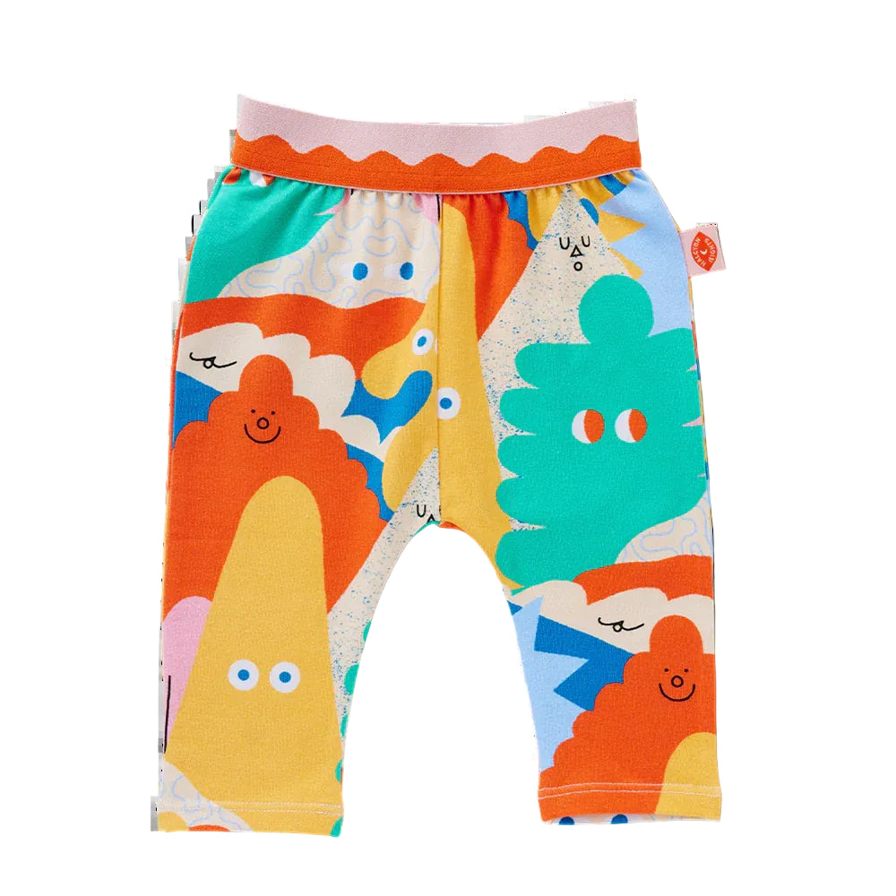 Colorful children's leggings with abstract character design on a white background