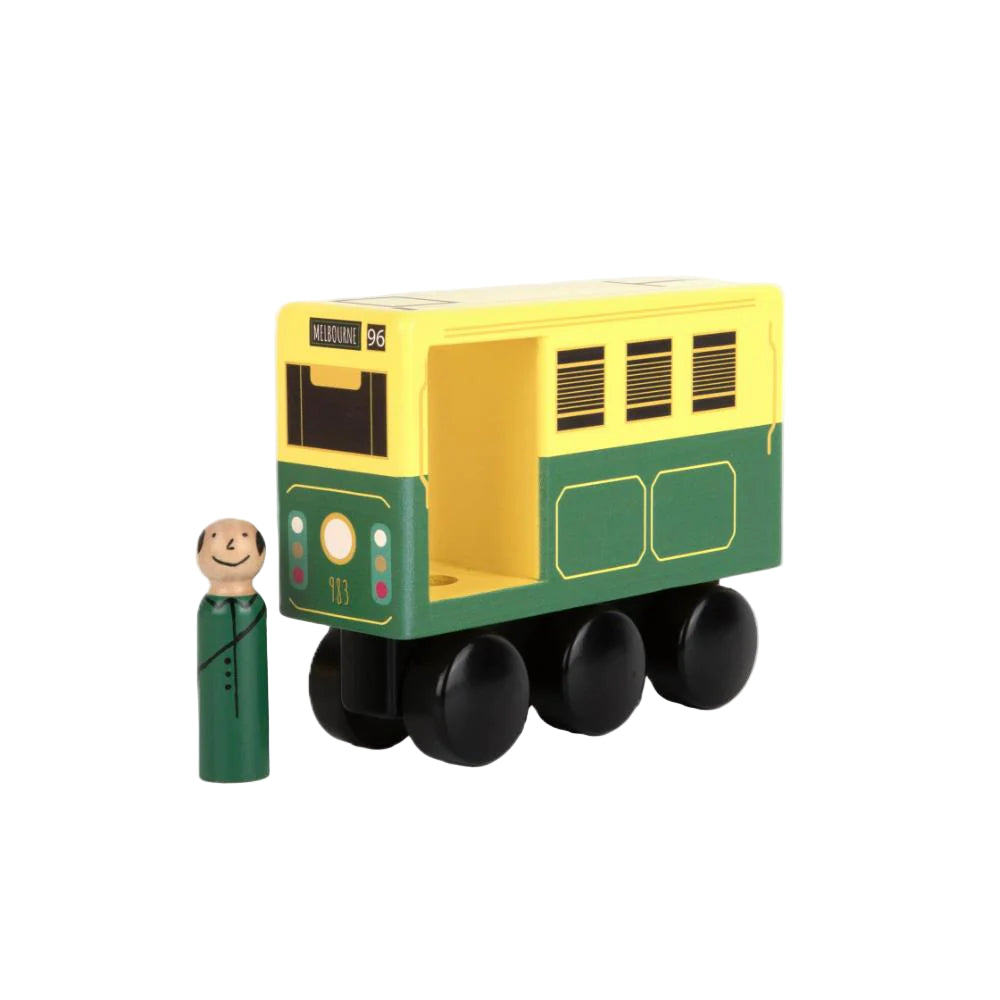 Toy tram with a small figure on a white background