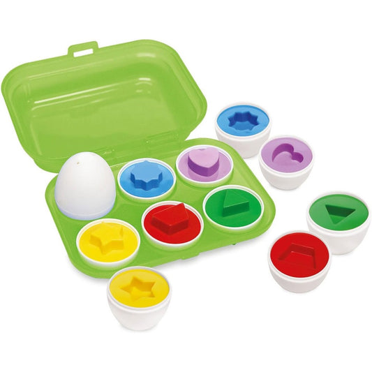 Colorful shape sorting toy set with a green carrying case on a white background
