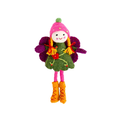 Colorful fairy doll with a pink hat and green dress on a white background