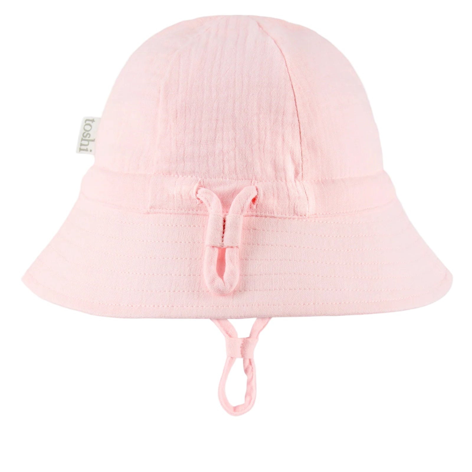 Pink sun hat with UPF 50+ label on a white background