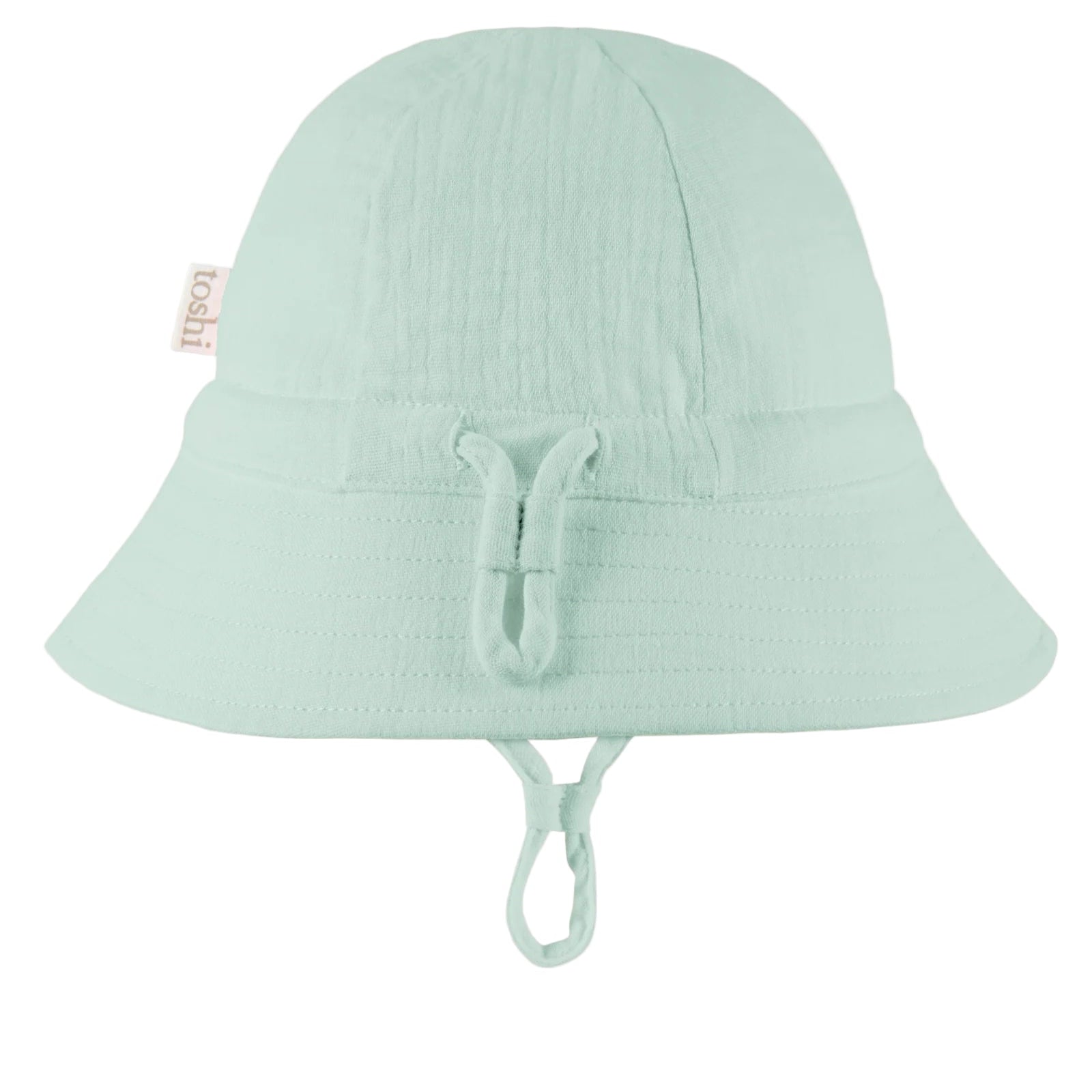 Light green bucket hat with UPF 50+ sun safety label on a white background