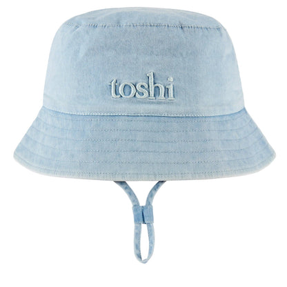 Light blue bucket hat with 'toshi' branding on a white background