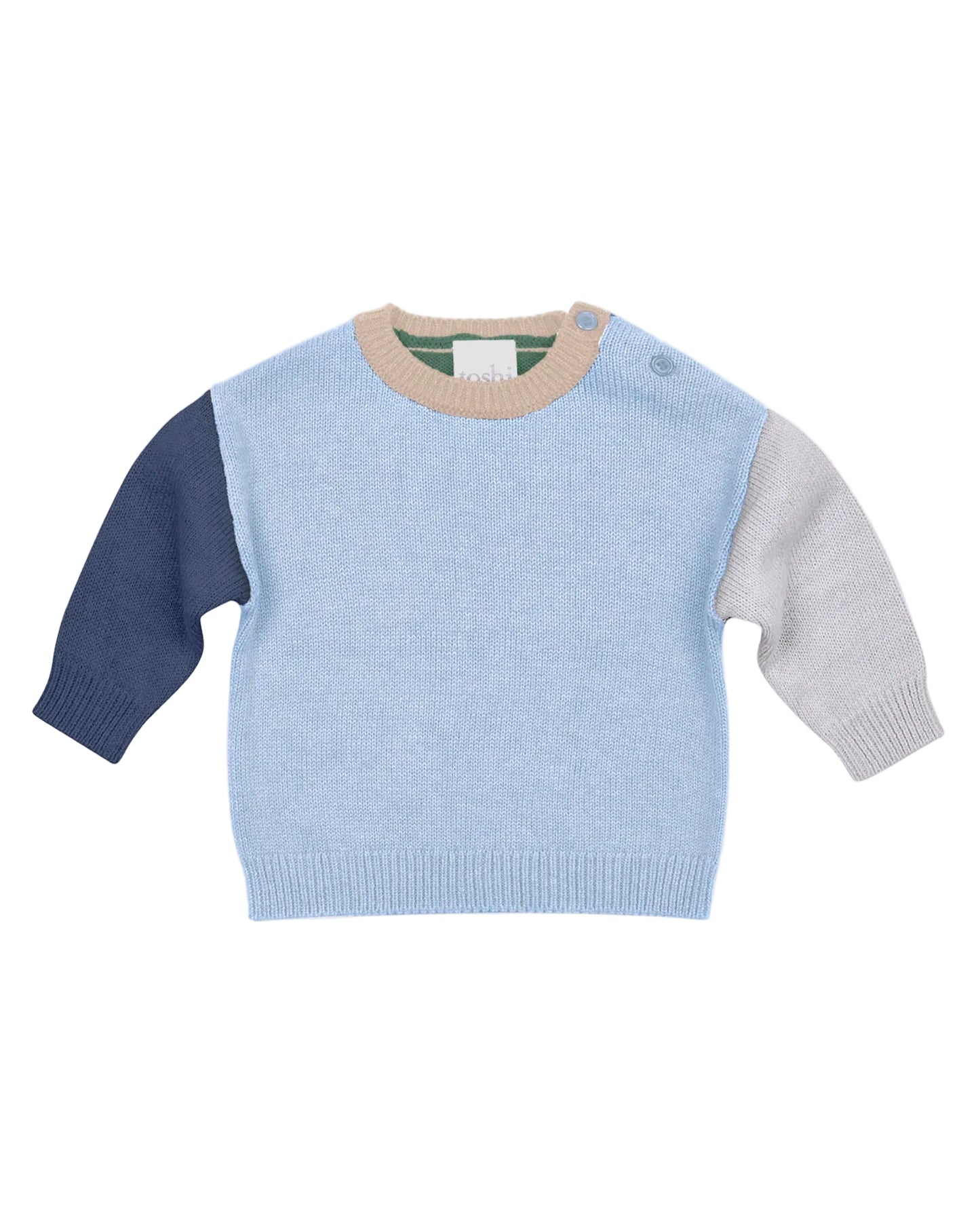 Color-blocked sweater with blue, gray, and navy on a light gray background