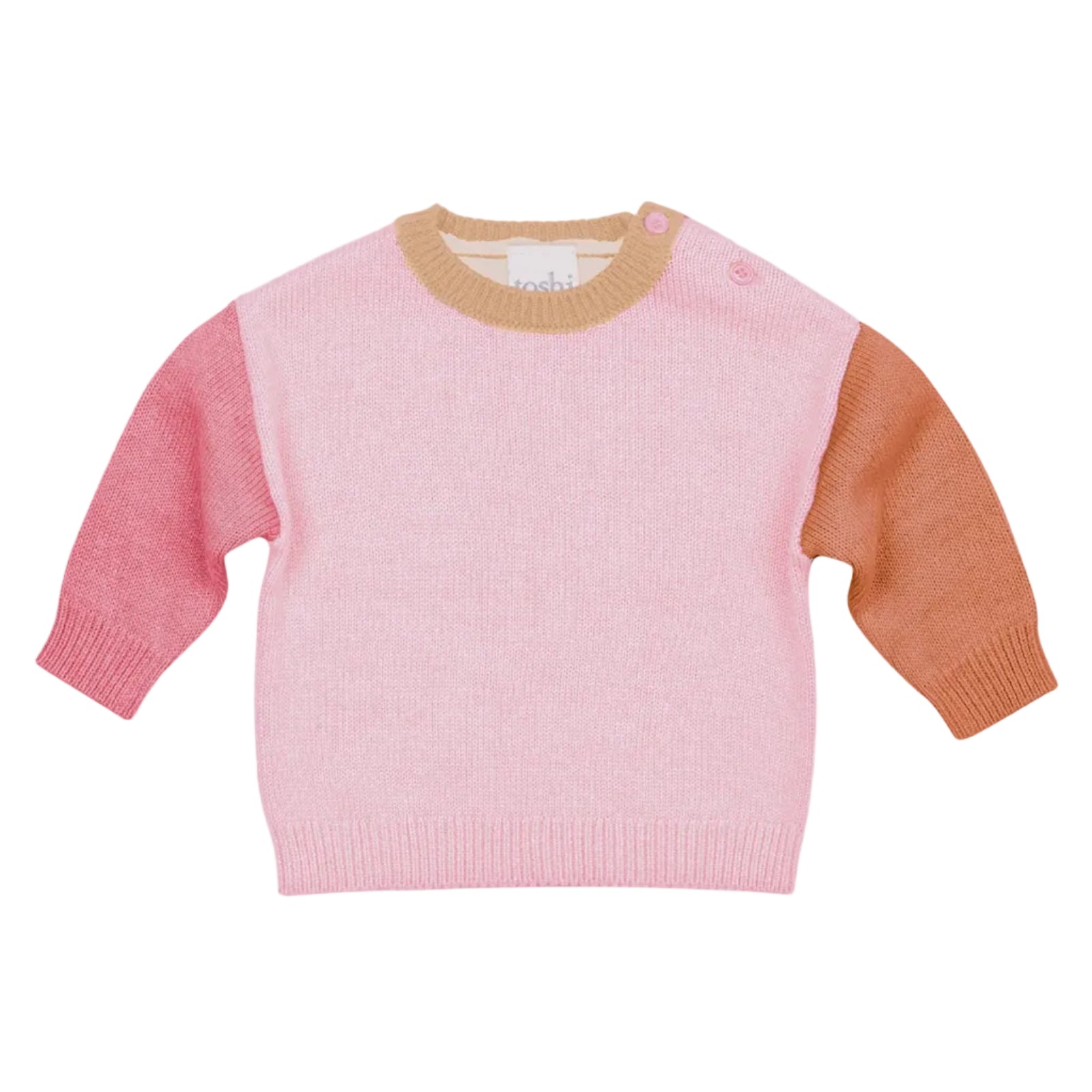 Pink sweater with brown sleeves on a light gray background