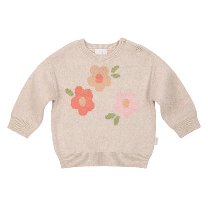 Beige baby sweater with floral patterns on a white background