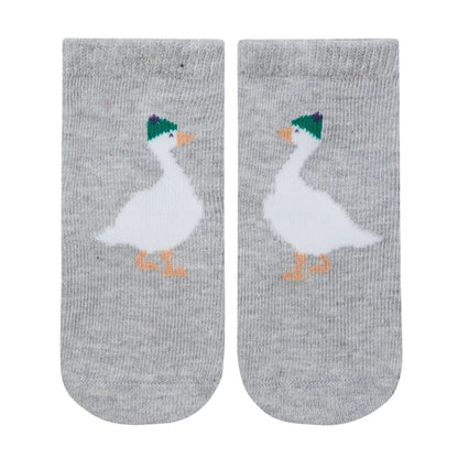 Pair of gray socks with duck design on a white background