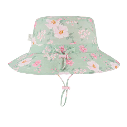 Floral-patterned sun hat with UPF 50+ label on a white background
