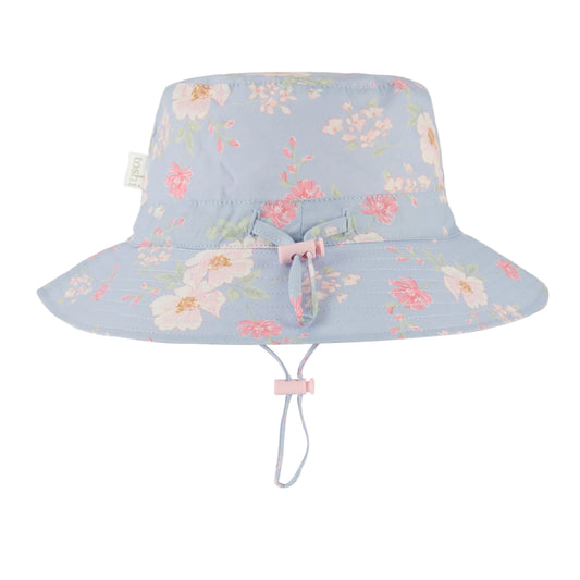 Floral-patterned sun hat with UPF 50+ label on a white background
