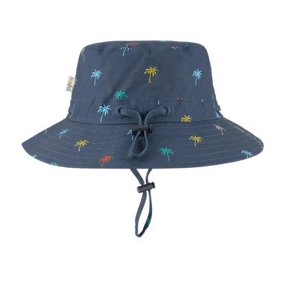 Navy bucket hat with palm tree pattern and UPF 50+ label on a white background