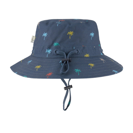 Navy bucket hat with palm tree pattern and UPF 50+ label on a white background