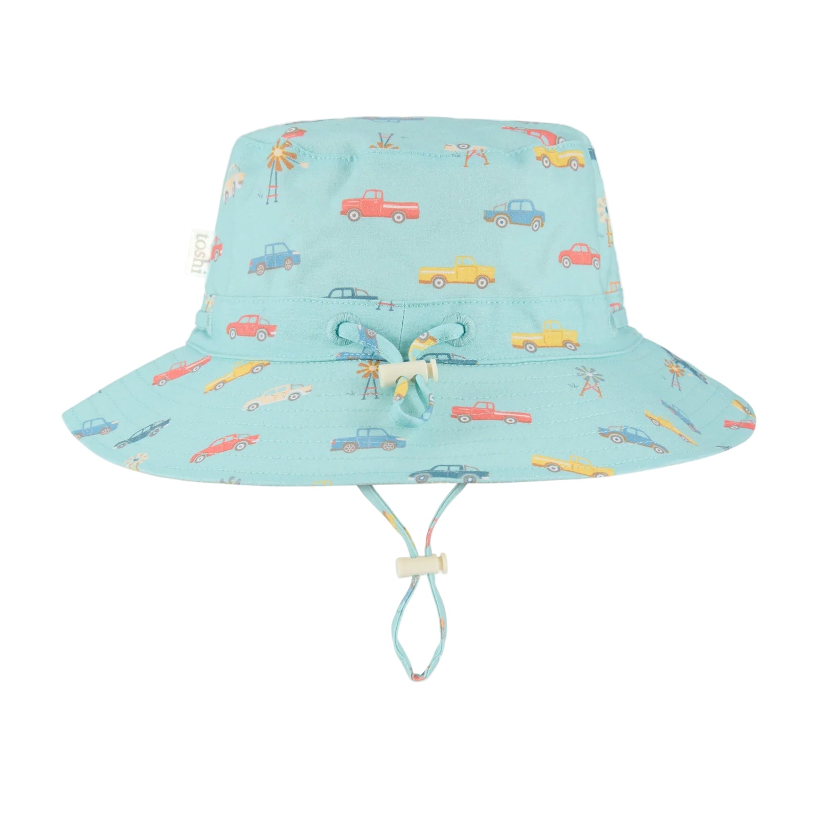 Children's sun hat with car pattern and UPF 50+ label on a light blue background