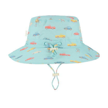 Children's sun hat with car pattern and UPF 50+ label on a light blue background
