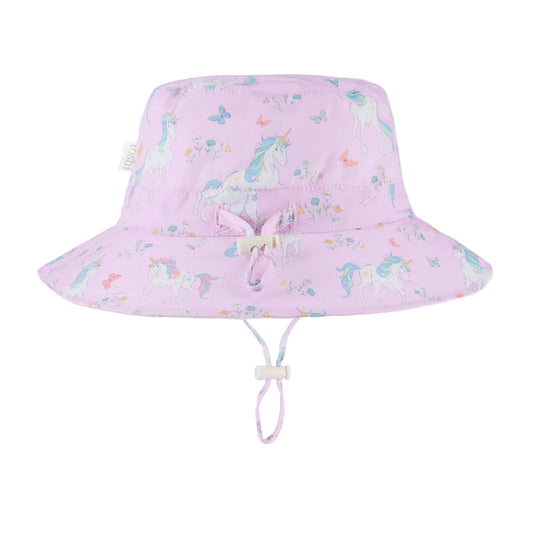 Pink bucket hat with unicorn pattern on a white background
