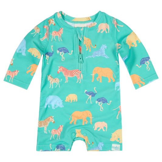 Children's swimsuit with animal pattern on a light blue background