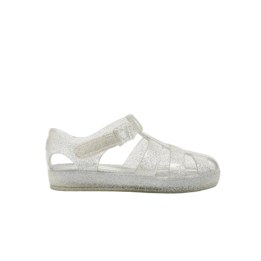 A single silver glitter jelly sandal for toddlers, shown from the side against a plain white background.