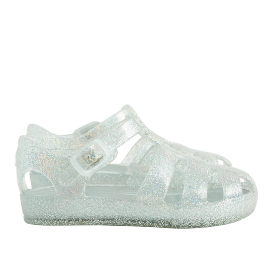 Clear glittery shoe on a white background